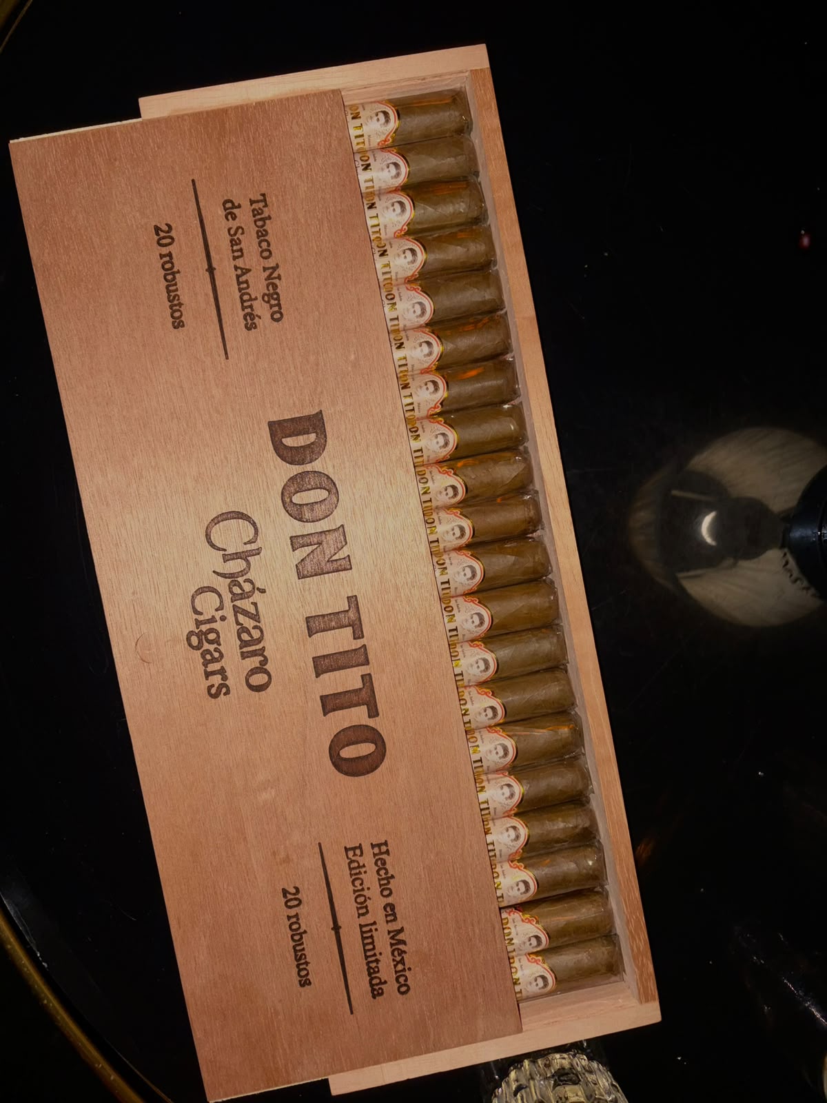 Don Tito Cházaro twenty piece wooden box with sliding lid